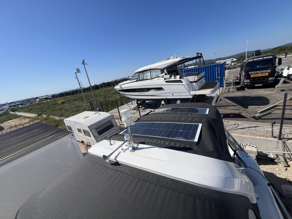 Installing solar panels on Bavaria S29 bimini using Velcro system